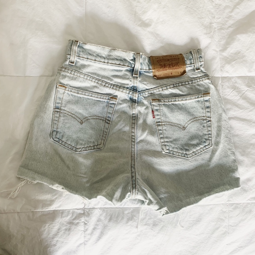 Levis 521 light wash high waisted shorts